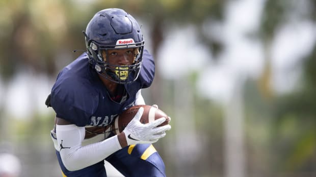 Naples (Fla.) cornerback Jonas Duclona running with the football.